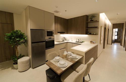 Al Khobar Apartment | HostE - 3 BR APT Full Kitchen 75In TV with Self-Entry