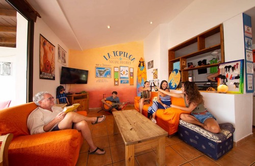 Costa Adeje Hostel | Guest Rated Hostel with Pool & Kitchen for 8 Travelers