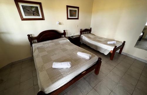 Macachin Hotel | Pet-Friendly Hostería COPAHUE with Family Amenities & 9/10 Rating
