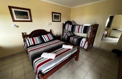 Macachin Hotel | Pet-Friendly Hostería COPAHUE with Family Amenities & 9/10 Rating
