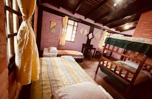 Banos de Agua Santa Cabin | Pet-Friendly Hostería EL Trapiche Lodge & Spa with Hot Tub