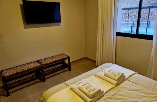 El Mollar Hotel | Pet-Friendly Hostería La Angostura with Oceanfront Pool