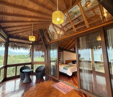 Puerto Lopez Hostel | Pet-Friendly Hostería Mandála with Oceanfront Pool Access