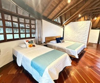 Puerto Lopez Hostel | Pet-Friendly Hostería Mandála with Oceanfront Pool Access