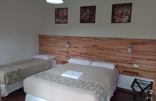 San Ignacio House | Inviting Hostería Montes: Family-Friendly with Pool Access