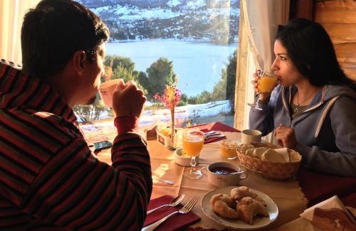 Villa Pehuenia Hotel | Discover Hosteria Al Paraiso: Oceanfront Escape with Beach