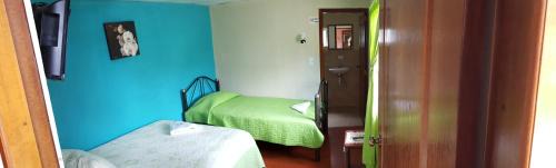 Tababela Hotel | Pet-Friendly Hosteria San Carlos Tababela with Pool & Kitchen