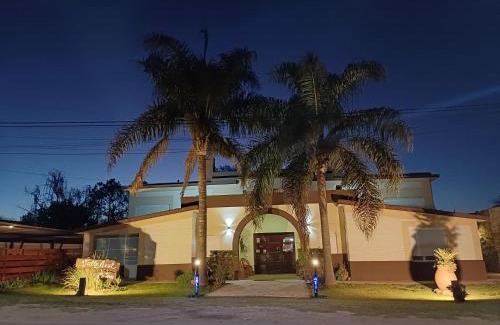 Villa Del Dique Hotel | Discover Inns in Villa del Dique with Pool and Breakfast