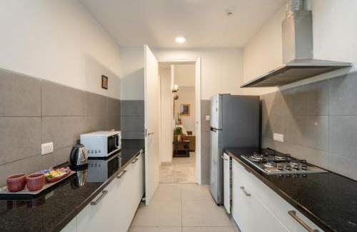 Sector 58 Apartment | Elegant 2BR Apt at Hostie Enigma Near Golf Course Road