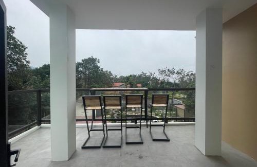 Soc Son Villa | Hosu Villa: Oceanfront Retreat with Pool & Pet-Friendly Perks