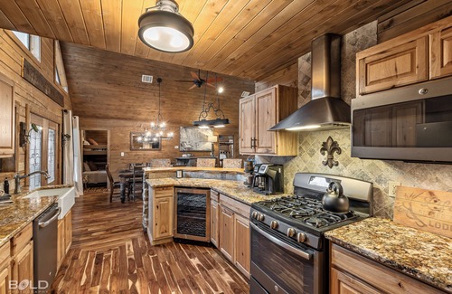 Shreveport House | Hot tub, Lakefront Lodge on Emerald Isle with Kayaks & Canoes, Fire Pit & Grill