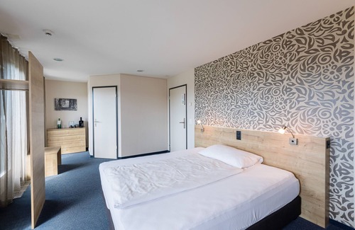 Oberentfelden Hotel | Discover Hotel aarau-WEST: Eco-Friendly Comfort Awaits