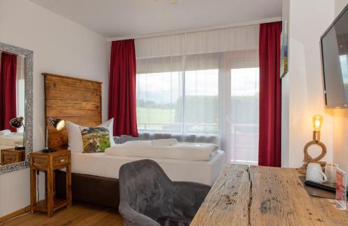 Hopfen am See Hotel | Hotel Alpenglühn: Oceanfront Bliss with Pet-Friendly Charm