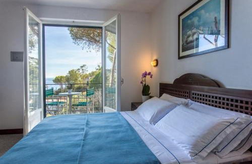 Lido di Capoliveri Hotel | Hotel Antares: Oceanfront Retreat with Pool & Private Beach