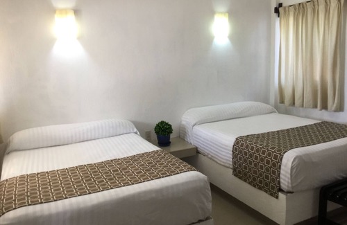Puerto Arista Hotel | Relaxing Getaway at Hotel Arista Bugambilias with Pool & Spa
