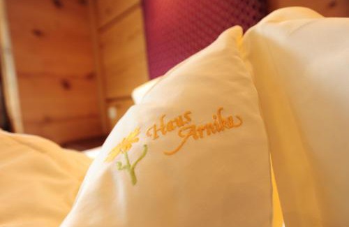 Ischgl Hotel | Experience Hotel Arnika: 4-Star Stay with Oceanfront Views