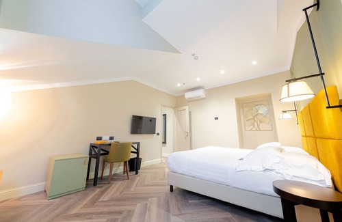 San Vincenzo Hotel | Experience Hotel Astoria: 4-Star Comfort with Spa & Dining