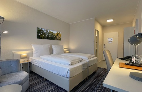Stadtbezirk 3 Hotel | Accessible Hotel Astra: Family-Friendly Stay with Breakfast