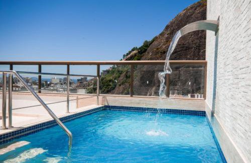Copacabana Hotel | Discover Hotel Atlântico Rio: Poolside Relaxation Awaits