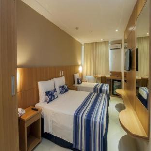 Copacabana Hotel | Discover Hotel Atlântico Rio: Poolside Relaxation Awaits