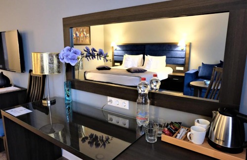 Rostov-on-Don Hotel | Discover Hotel Avant-Garde: 4-Star Stay with Pool & Hot Tub