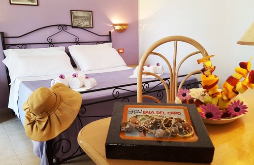 Santa Maria Hotel | Experience Comfort at Hotel Baia del Capo with Pool & Dining