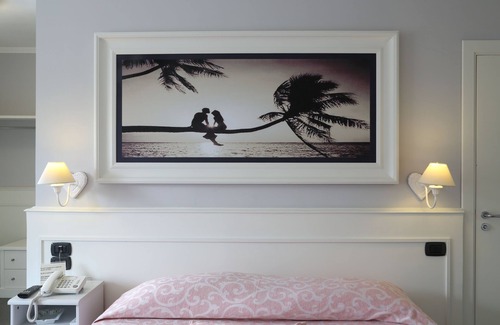 Giugliano in Campania Hotel | Discover Hotel Barbarella: Poolside Relaxation Awaits