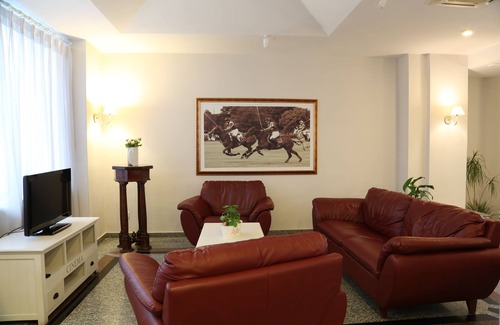 Giugliano in Campania Hotel | Discover Hotel Barbarella: Poolside Relaxation Awaits