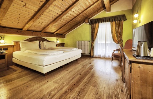 Madonna di Campiglio Hotel | Discover Hotel Bertelli: 4-Star Retreat with Spa & Pool