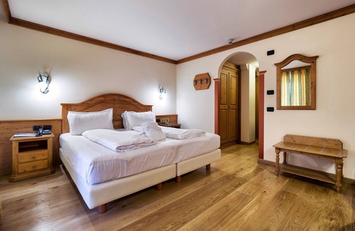 Madonna di Campiglio Hotel | Discover Hotel Bertelli: 4-Star Retreat with Spa & Pool