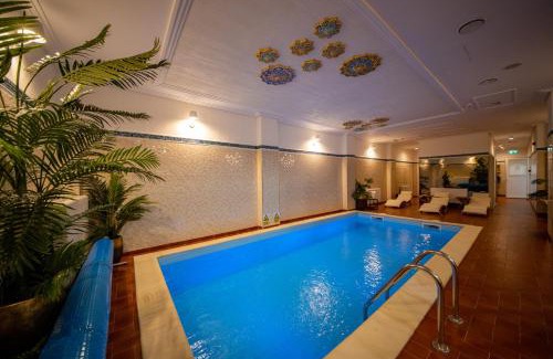 Caciulata Hotel | Discover Hotel Bloom: Oceanfront Oasis with Spa & Pool