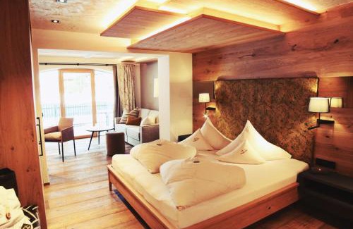 Tannheim Hotel | Hotel Bogner Hof: Oceanfront Retreat with Spa & Hot Tub