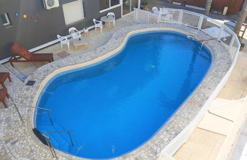 Villa Carlos Paz Hotel | Budget-Friendly Hotel Brisas with Pool & Family Amenities