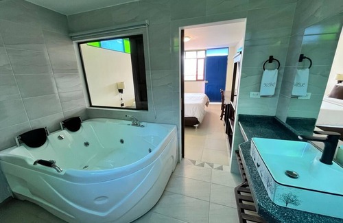 Paipa Hotel | Discover Hotel Cabañas San Cayetano: Spa & Family Fun!