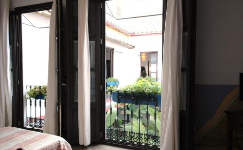 Distrito Centro Hotel | Experience Hotel Casa de los Azulejos with Ocean Views