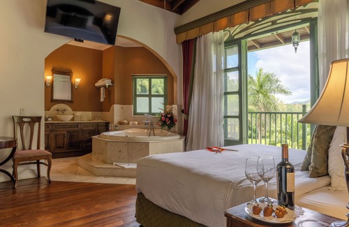 La Suiza Hotel | Relax at Hotel Casa Turire: 4-Star Comfort with Spa & Pool