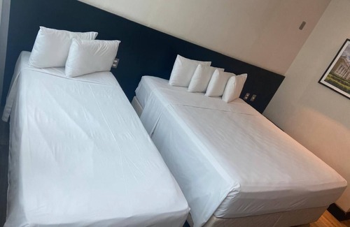 Funcionarios Hotel | Discover TRYP Belo Horizonte Savassi: Spa & Family-Friendly