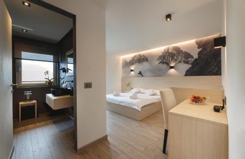 San Lorenzo in Banale Hotel | Unforgettable Stays at Hotel Castel Mani with Ocean Views