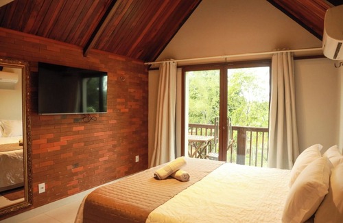 Martins Hotel | Discover Hotel Chalé Lagoa dos Ingás - Pool & Spa Retreat