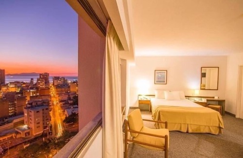 Puerto La Cruz Hotel | Comfortable Stay at Hotel Cristina Suites with Pool & Ocean View
