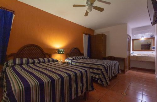 Degollado Hotel | Cozy Hotel Degollado: Breakfast Included & Family-Friendly