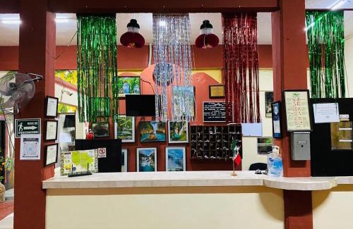 El Naranjo Hotel | Discover Hotel Del Valle: Family-Friendly with Pool Access