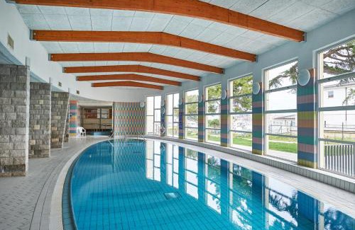 Izola Hotel | Discover Hotel Delfin: Oceanfront Retreat with Pool Access