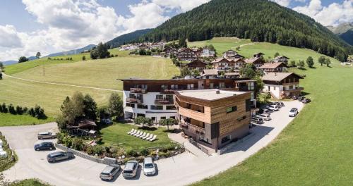 Terento Hotel | Hotel Dolomitenblick: Oceanfront Retreat with Spa & Pool