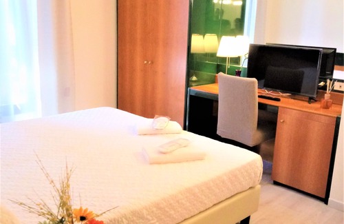 Dozza Hotel | Comfortable Stay at Hotel Dozza with Family-Friendly Amenities