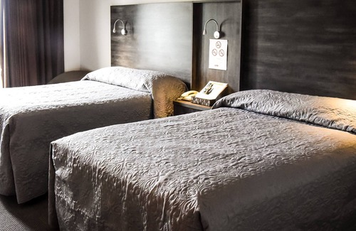 Amos Hotel | Budget-Friendly Stay at Hotel Econo-One with Family Amenities