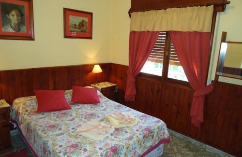 La Falda Hotel | Pet-Friendly Hotel El Nogal with Pool and Family Amenities
