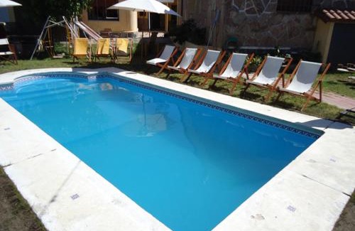 La Falda Hotel | Pet-Friendly Hotel El Nogal with Pool and Family Amenities