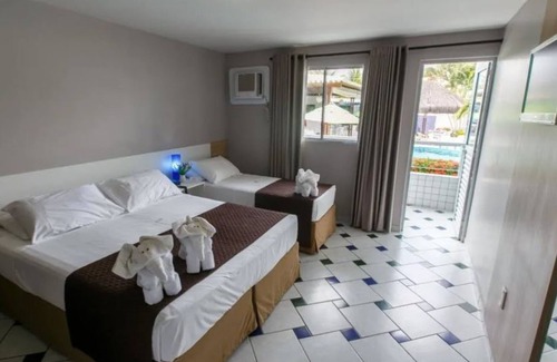 Santo Agostinho Hotel | Discover Hotel Enseada dos Corais with Ocean Views & Pool