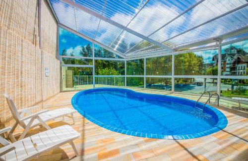 Capivari Hotel | Discover Hotel Euro Suíte Campos do Jordão with Scenic Views